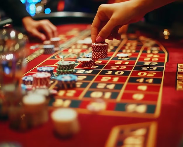 qjoker app showing live casino tables and sportsbook betting interface